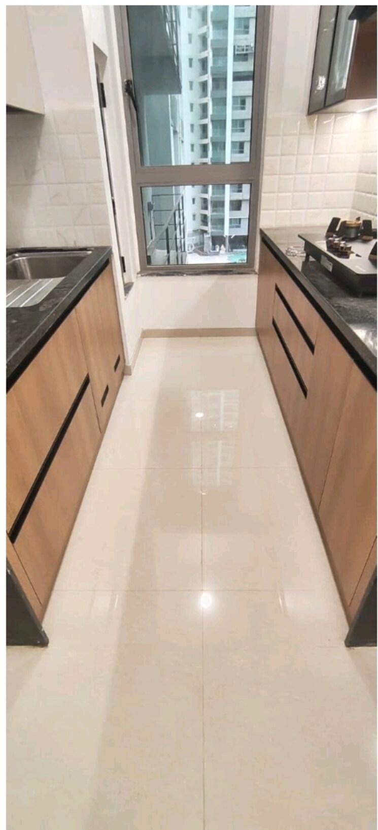 Kitchen, kalpataru-immensa 3 Bedroom 905 Sq.Ft. Apartment In Kolshet Road Thane 9675836