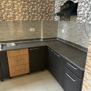 Kitchen in 3 BHK Apartment at Nirala Eden Park, Sector 51 – for Sale