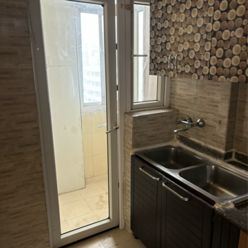 Kitchen in 3 BHK Apartment at Nirala Eden Park, Sector 51 – for Sale