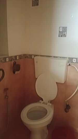 Bathroom in 2 BHK Apartment at Takshila CHS, Andheri East – for Rent