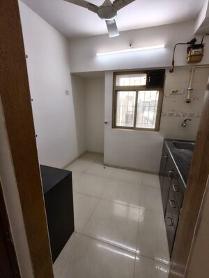 Kitchen in 1 BHK Apartment at Galaxy Heights, Goregaon West – for Rent