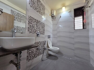 Bathroom in 2 BHK Apartment at Goregaon East – for Rent