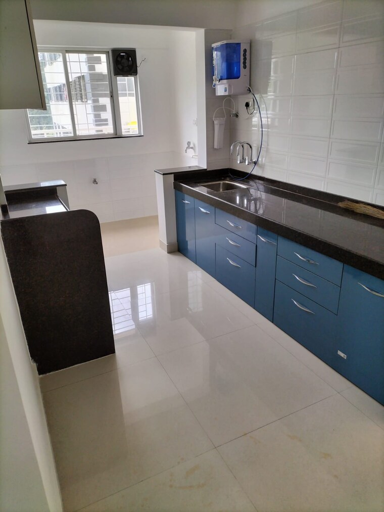 Kitchen, rainbow-blue-roof-sera 2 Bedroom 757 Sq.Ft. Apartment In Sus Pune 9676711