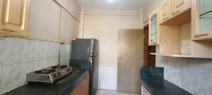 Kitchen in 2 BHK Apartment at Dandelion Apartment, Bandra West – for Rent
