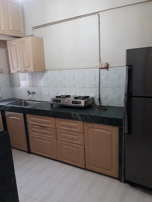 Kitchen in 2 BHK Apartment at Dandelion Apartment, Bandra West – for Rent
