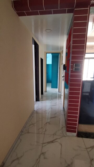 Building Lobby in 2 BHK Apartment at Rustomjee Elanza, Malad West – for Rent