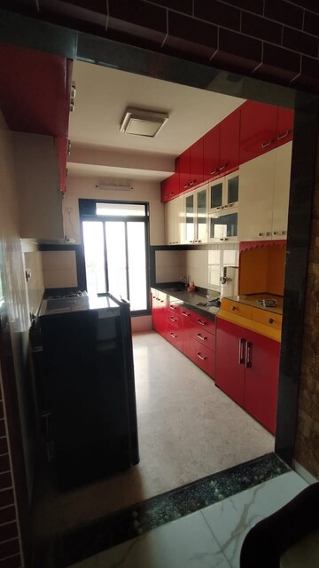 Kitchen in 2 BHK Apartment at Rustomjee Elanza, Malad West – for Rent