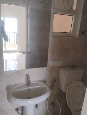 Bathroom in 2 BHK Apartment at Gaur Yamuna City 16th Park View, Gaur Yamuna City – for Rent