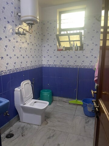 Bathroom in 3 BHK Builder Floor at Laxmi Garden Gurgaon, Sector 10a – for Rent