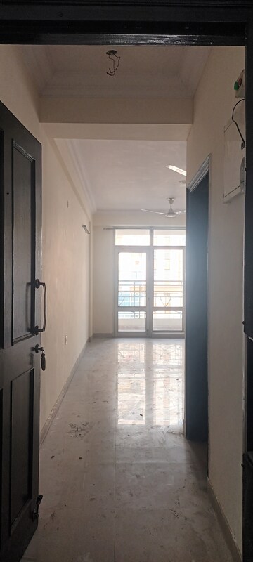 Living Room in 3 BHK Apartment at Ramprastha Greens – for Sale