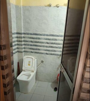 Bathroom in 3 BHK Apartment at Baradwari – for Rent