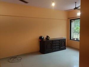 Living Room in 1 BHK Apartment at Acme Elite, Andheri East – for Rent