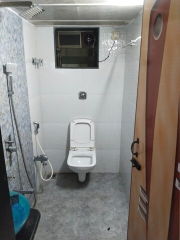 Bathroom in 3 BHK Apartment at Kopar Khairane – for Rent