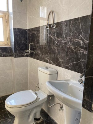 Bathroom in 2 BHK Apartment at Gulmohur Garden, Raj Nagar Extension – for Sale