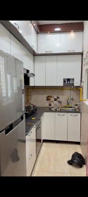 Kitchen in 1 BHK Apartment at Gaur City 2 - 14th Avenue, Sector 16c Greater Noida – for Rent
