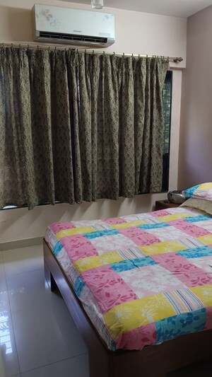 Bedroom in 2 BHK Apartment at Takshila CHS, Andheri East – for Rent