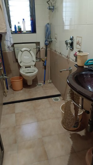 Bathroom in 2 BHK Apartment at Takshila CHS, Andheri East – for Rent