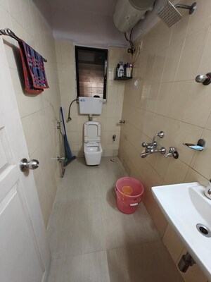 Bathroom in 2 BHK Apartment at Palash Towers, Andheri West – for Rent