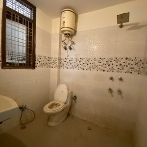 Bathroom in 2 BHK Builder Floor at Chattarpur – for Rent