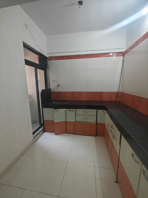 Kitchen in 2 BHK Apartment at Seawoods Sector 50 – for Sale