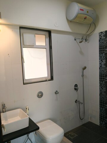 Bathroom in 2 BHK Apartment at Paranjape Schemes Royal Court, Andheri East – for Rent
