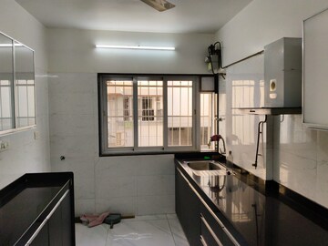 Kitchen in 2 BHK Apartment at Paranjape Schemes Royal Court, Andheri East – for Rent