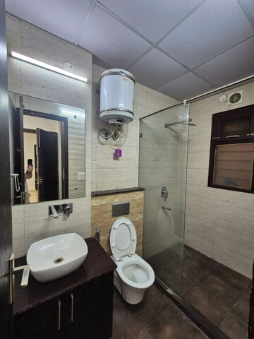 Bathroom in 3 BHK Apartment at Ansal API Esencia, Sector 67 – for Rent