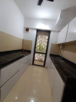 Kitchen in 2.5 BHK Apartment at Lodha Lakeshore Greens, Dombivli East – for Rent