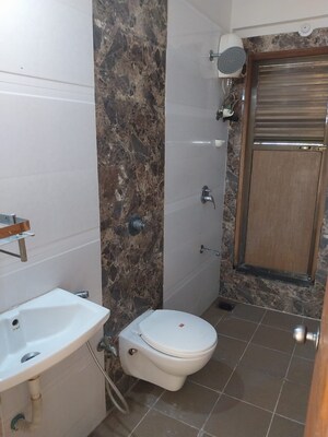 Bathroom in 3 BHK Apartment at Sethia Link View, Goregaon West – for Sale