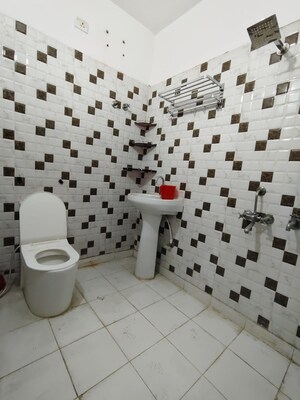 Bathroom in 2.5 BHK Apartment at Khirki Extension – for Rent