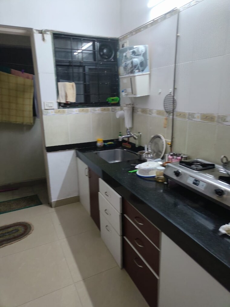 Kitchen, magarpatta-city-iris 2 Bedroom 1000 Sq.Ft. Apartment In Hadapsar Pune 9679485