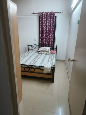 Bedroom in 2 BHK Apartment at Magarpatta City Iris, Hadapsar – for Rent