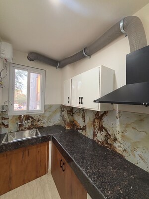 Kitchen in 1.5 BHK Builder Floor at DLF City Phase III, Sector 24 – for Rent