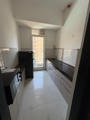 Kitchen in 1 BHK Apartment at Ashar Edge, Pokhran Road No Two – for Rent