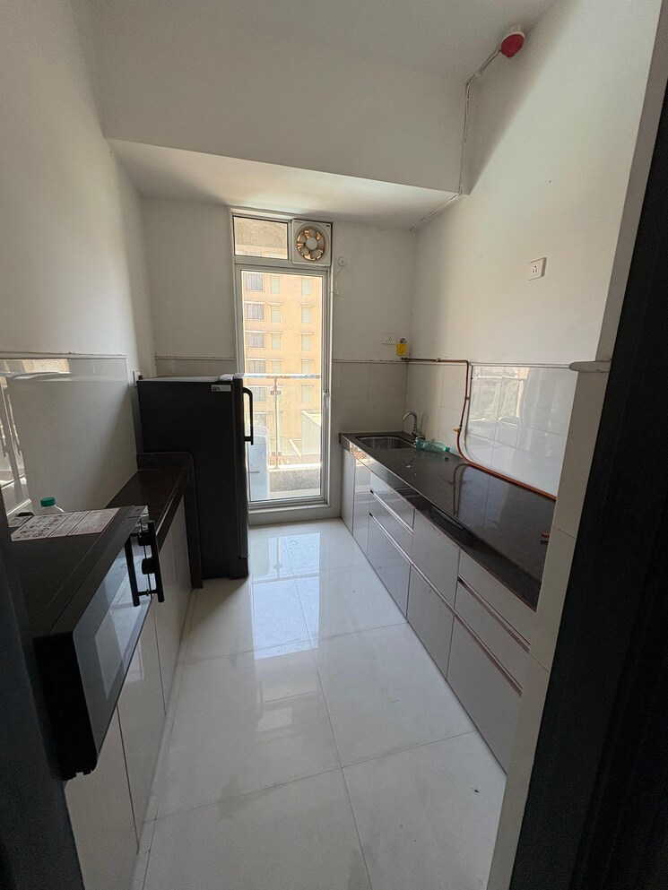 Kitchen, ashar-edge 1 Bedroom 490 Sq.Ft. Apartment In Pokhran Road No Two Thane 9679665