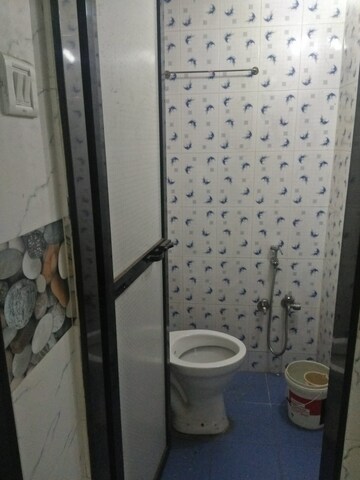 Bathroom in 2 BHK Apartment at Harasiddh Viraaj, Malad East – for Rent