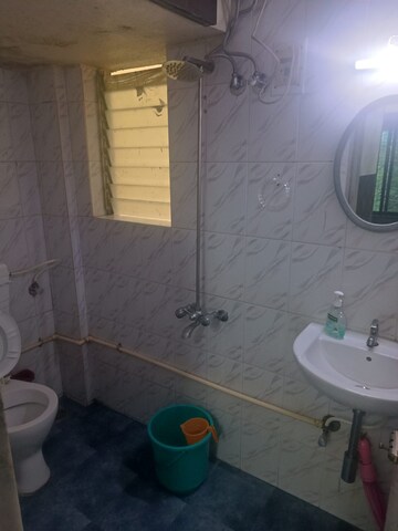 Bathroom in 1 BHK Apartment at Riddhi Garden, Malad East – for Rent