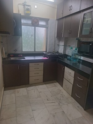 Kitchen in 1 BHK Apartment at Riddhi Garden, Malad East – for Rent