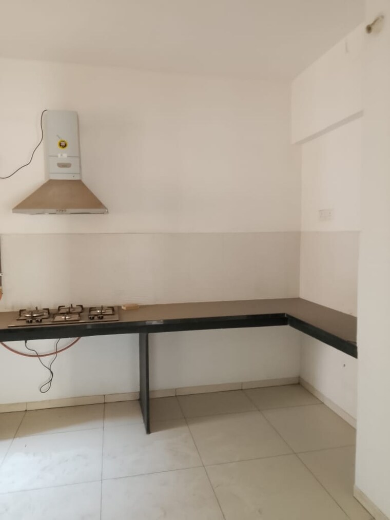 Kitchen, pride-world-city-kingsbury 2 Bedroom 697 Sq.Ft. Apartment In Charholi Budruk Pune 9680055