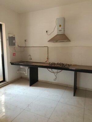 Kitchen in 2 BHK Apartment at Pride World City Kingsbury, Charholi Budruk – for Rent