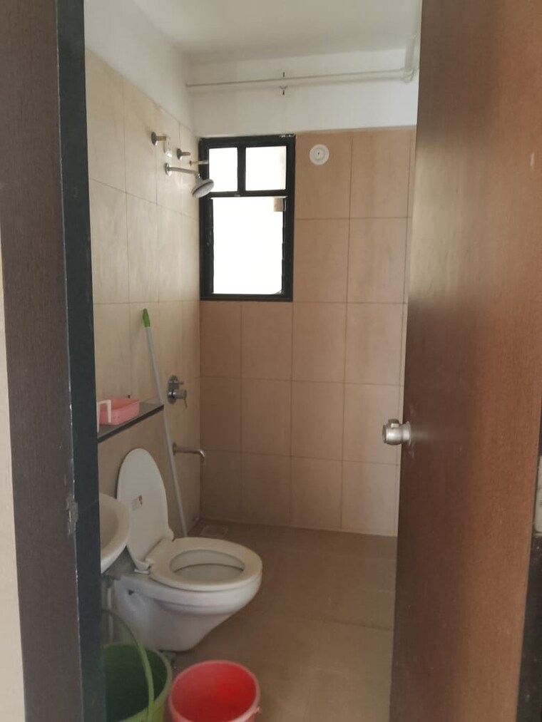 Bathroom, pride-world-city-kingsbury 2 Bedroom 697 Sq.Ft. Apartment In Charholi Budruk Pune 9680108