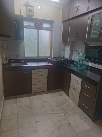 Kitchen in 1 BHK Apartment at Riddhi Garden, Malad East – for Rent