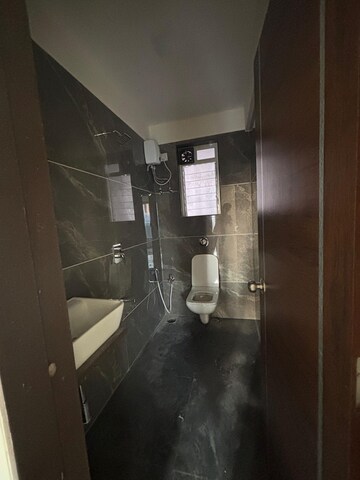 Bathroom in 2 BHK Apartment at SL Nandanvan Mohan CHS, Dahisar East – for Rent