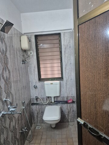 Bathroom in 1 BHK Apartment at Rashmi Chhaya CHS, Kandivali West – for Rent