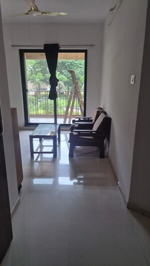 Living Room in 3 BHK Apartment at Pride World City Kingsbury, Charholi Budruk – for Rent