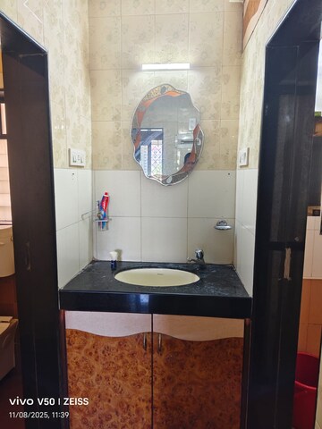 Bathroom in 1 BHK Apartment at Satellite Garden, Goregaon East – for Rent