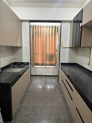 Kitchen in 1 BHK Apartment at Omkar Signet, Malad East – for Rent