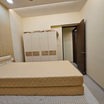 Bedroom in 2 BHK Apartment at Divine Ambrosia Apartment, Devi Pada – for Sale