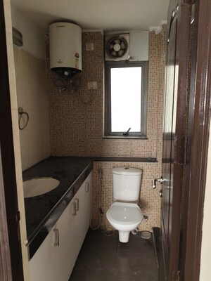 Bathroom in 2 BHK Apartment at Unitech Uniworld Resorts-The Residences, Sector 33 – for Rent