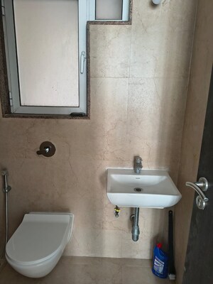 Bathroom in 1 BHK Apartment at Puranik Rumah Bali, Ghodbunder Road – for Rent